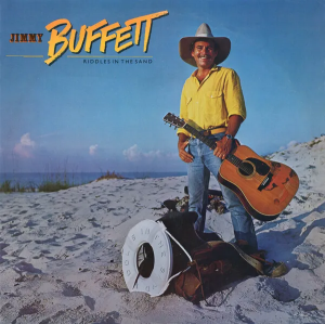 Jimmy Buffett Riddles In The Sand Cover Art — Buffett in June option 28