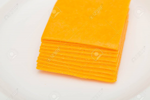 36882046 Sliced Cheddar Cheeses On A White Platejpg — Burger ingredients option 1